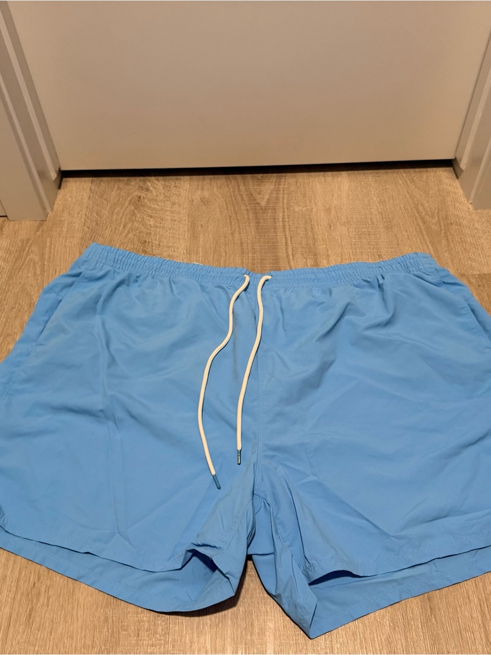 Plus size womenโs Eddie Bauer Light Blue Swim Shorts with Drawstring